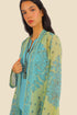 Coat in cotton voile with asymmetric hemline